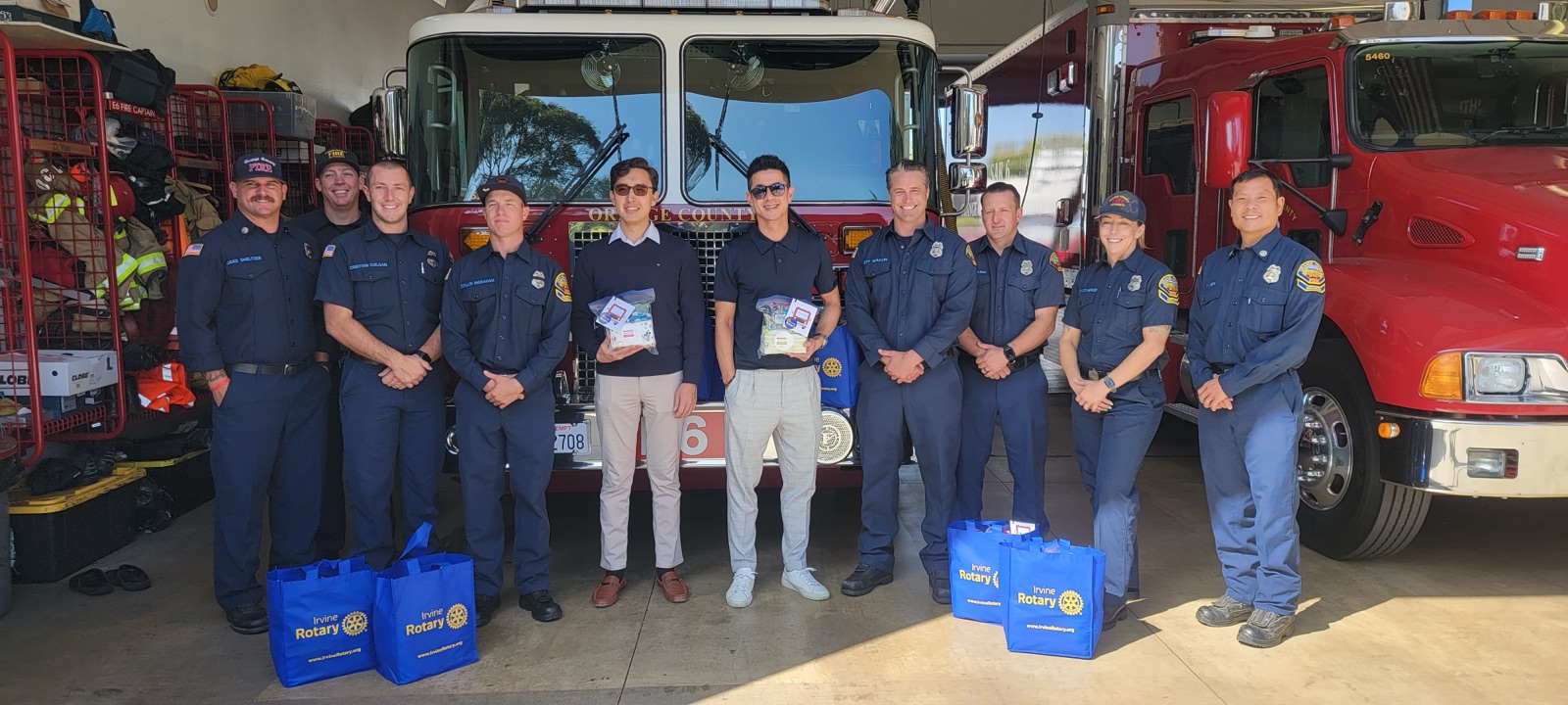 Orange County firefighters with Irvine Rotary care bags, October 2024
