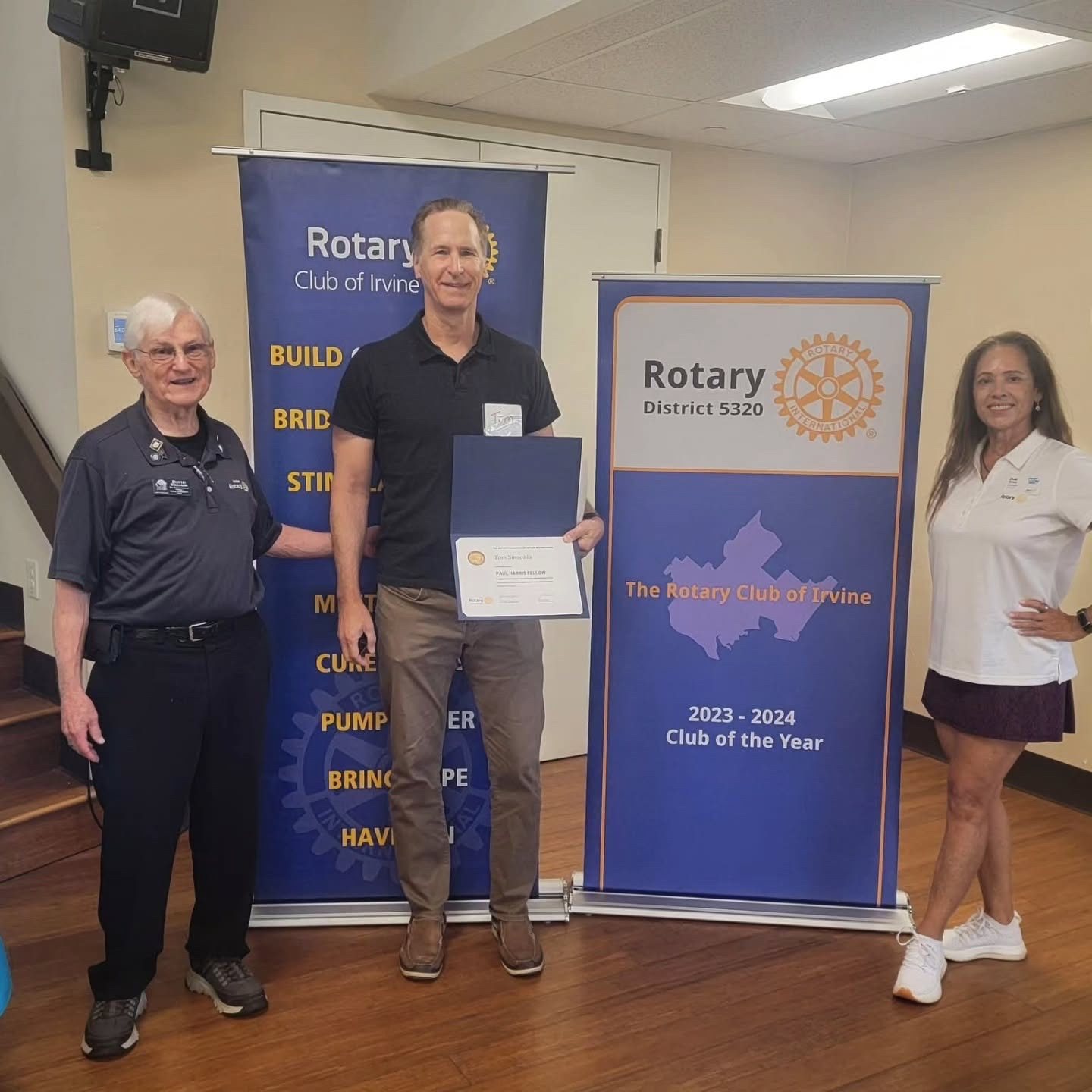 Tom Smagala receiving Paul Harris recognition at the Rotary Club of Irvine