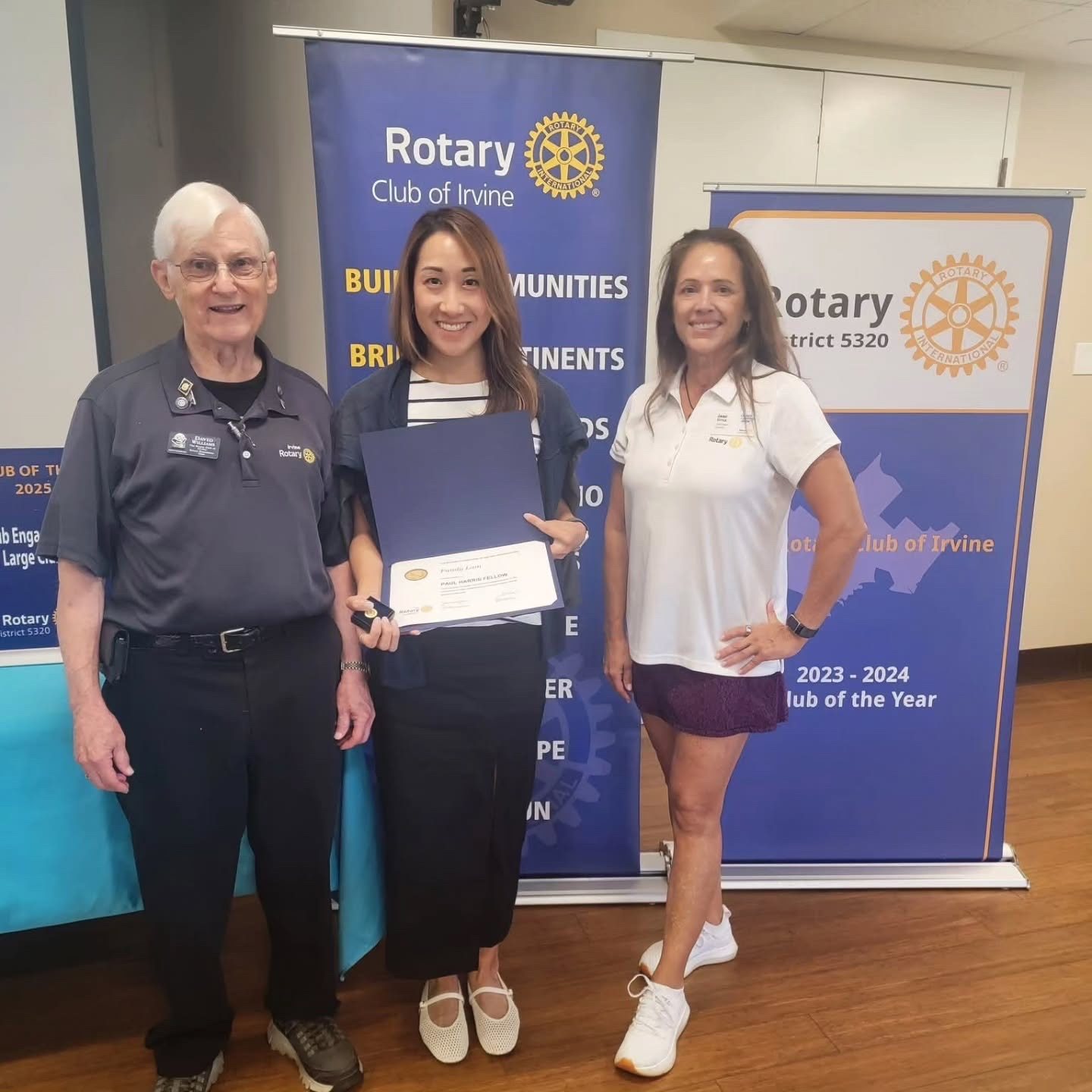 Fandy Lam receiving Paul Harris recognition at the Rotary Club of Irvine