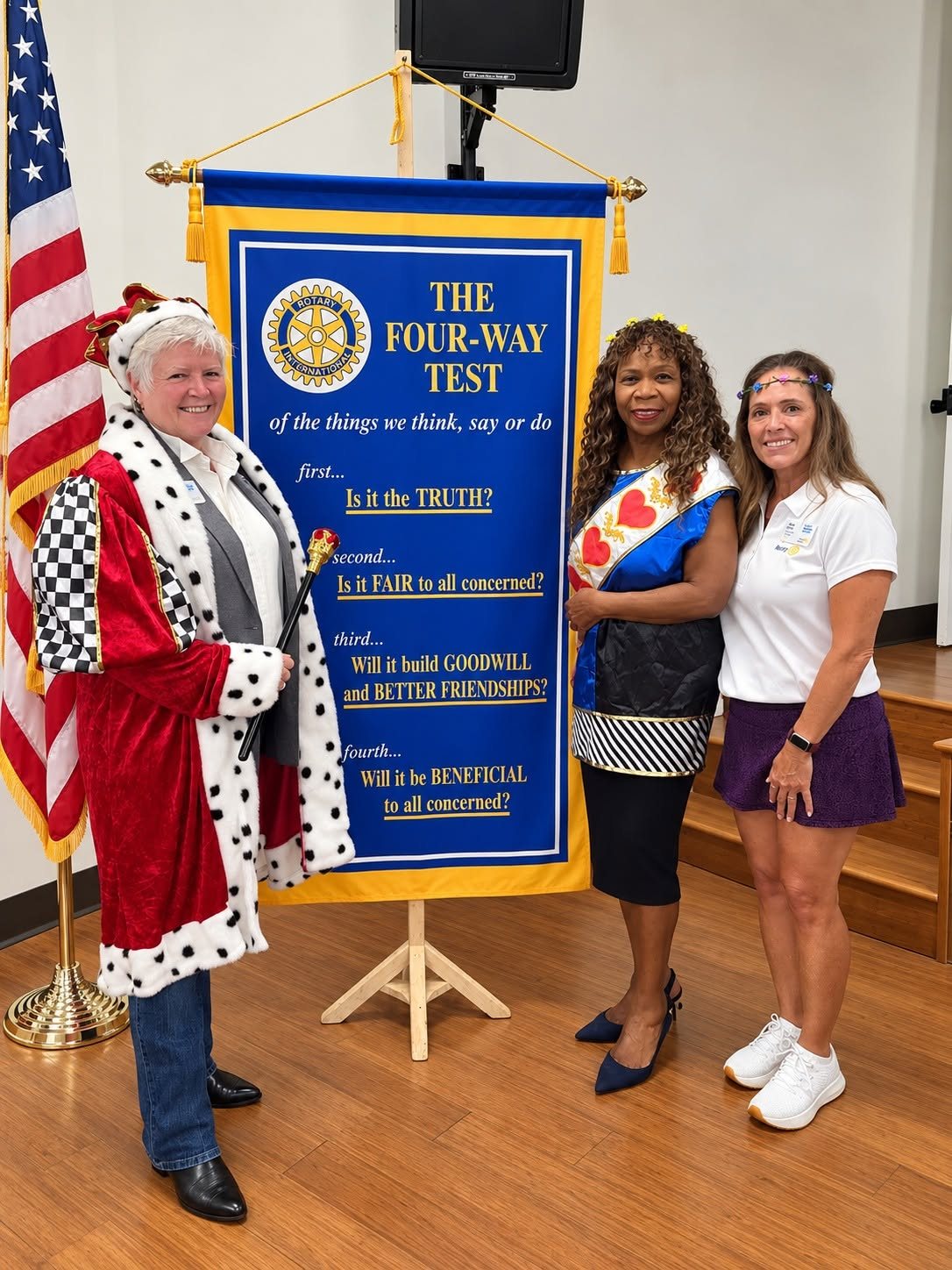 District Governor Monica Peters crowned next to the Four-Way Test banner